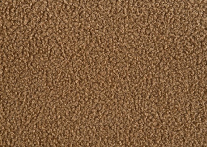 Aaron Contemporary Brown Boucle Sofa Sloped Arms Brown sofa in a modern living room with decor elements.