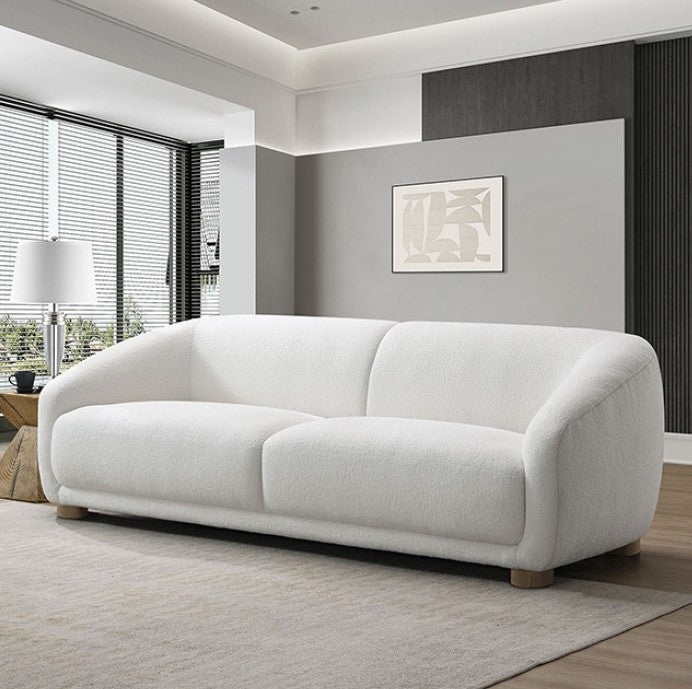 Aaron Contemporary White Boucl Sofa Sloped Arms White sofa in a modern living room with a neutral color palette.
