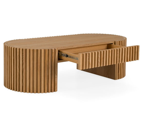 Agata Coffee Table - Natural Ash Finish Wooden coffee table with a ribbed design and an open drawer on a white background