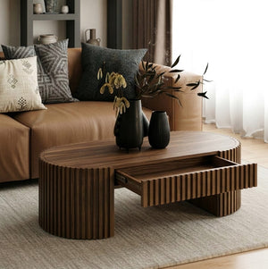 Agata Modern Style Walnut Desk Wooden coffee table with decorative items in a living room setting