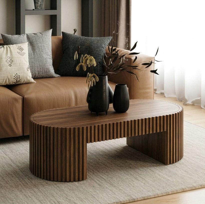 Agata Coffee Table - Walnut Finish Wooden coffee table with decorative items in a living room setting