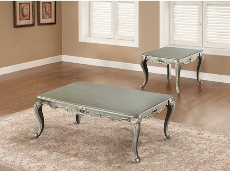 Albert Traditional Champagne End Table Decorative silver table with ornate legs on a wooden floor.