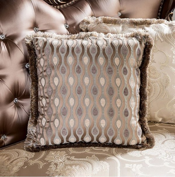 Decorative pillow with patterned design on a textured surface
