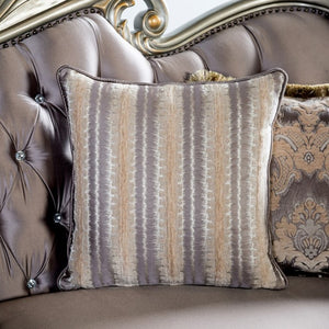 Decorative pillow with striped pattern on a plush sofa