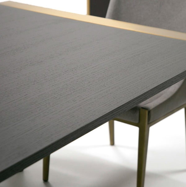 Alessa Modern Dining Table - Brass & Wenge Gray dining table with a chair on a white background