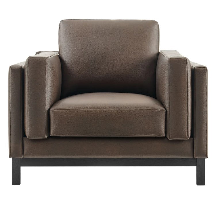 Amadeo Espresso Vegan Leather Modern Chair Brown leather armchair in a living room setting with a window and bookshelf in the background.