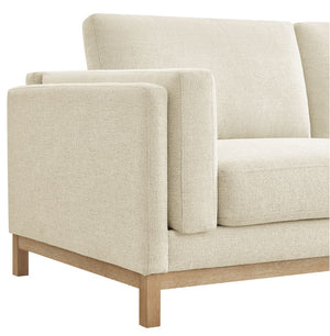 Amadeo Ivory Deep Seat Comfort Modern Fabric Sofa Beige sofa with wooden legs on a white background