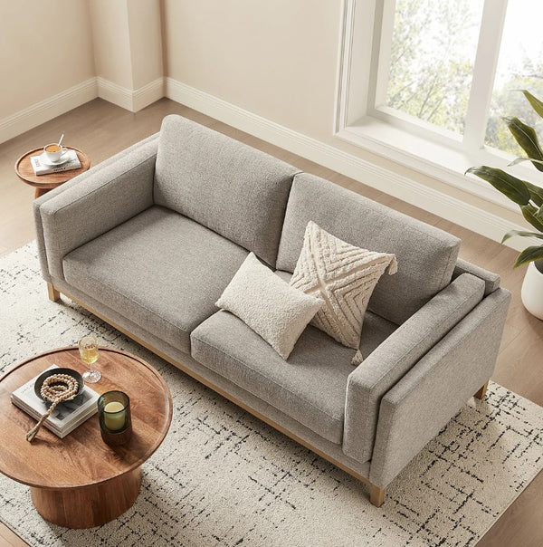Amadeo Pewter Deep Seat Comfort Modern Fabric Sofa Gray sofa with decorative pillows in a living room setting