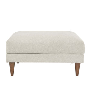 Living room with a ivory ottoman,