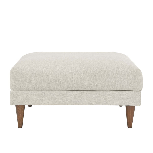 Living room with a ivory ottoman,