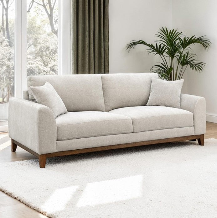 Arieal Mid-Century Modern Chenille Fabric Sofa Light gray sofa in a room with large windows and a plant