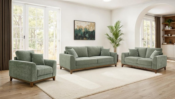 Arieal Mid-Century Modern Olive Green Chenille Fabric Sofa Green sofa set in a living room with large windows and a plant.