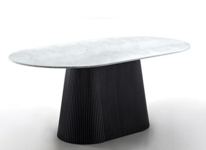 Arleto Modern Black White Top Oval Dining Table Modern table with a white marble top and black pleated base on a white background