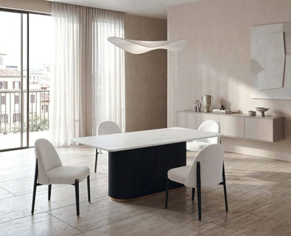 Arleto Modern Black White Top Rectangular Dining Table Style Modern dining room with a white table and chairs in a well-lit room.