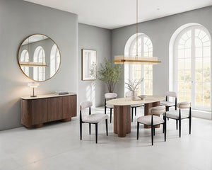 Arleto Modern Walnut Oval Dining Table Modern dining room with wooden table, chairs, and sideboard against a gray wall.