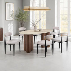 Arleto Modern Walnut Oval Dining Table Dining room with a round wooden table and chairs in a bright room.