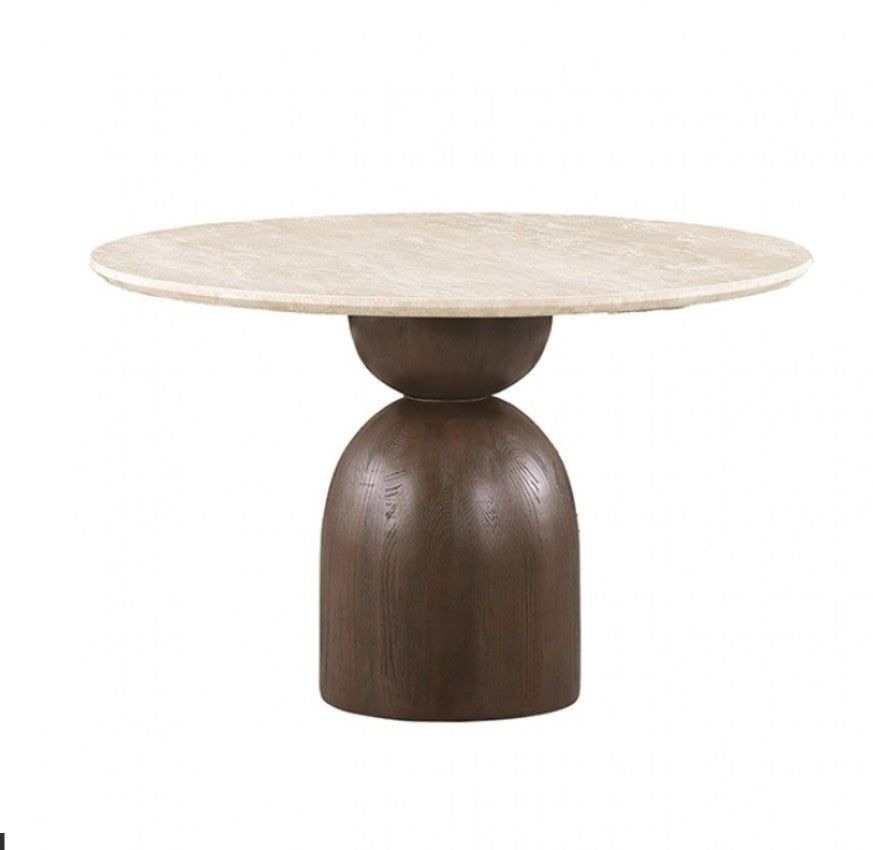 Artemos Contemporary Light Beige Round Dining Table Round dining table with a light beige stone top and a dark brown sculptural pedestal base, accompanied by two woven-back chairs with cream upholstered seats, shown in a softly lit dining room.