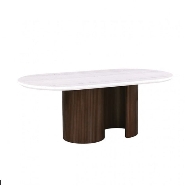 Artemos Contemporary White Oval Dining Table An oval dining table featuring a white marble-look top with subtle gray veining and a sculptural dark brown fluted pedestal base, shown against a plain white background.