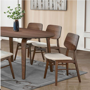 Artemos Mid Century Walnut Oval Dining Table A 5-piece dining set featuring a round wooden table and four matching chairs with cream upholstered seats, styled in a modern dining room setting.