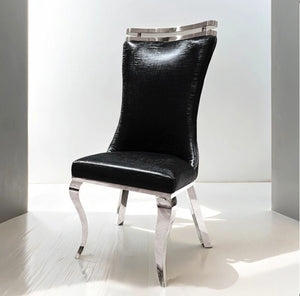 Asher Silver Black Leatherette Dining Chair 2-Pack Modern black chair with silver accents on a white background