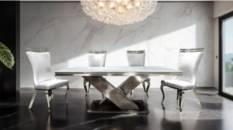 Asher Silver White Cross Shaped Glam Dining Table Modern dining table with chairs in a high-rise setting with city views