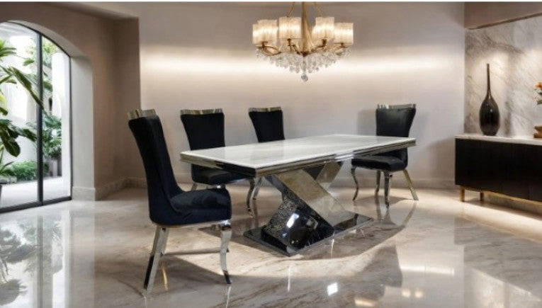 Asher Silver White Cross Shaped Glam Dining Table Modern dining table with chairs in a high-rise setting with city views