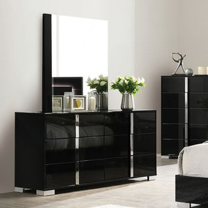 Asiko Modern UV Finish Piano Black Dresser A glossy black bedroom furniture set featuring a large dresser with an attached rectangular mirror, matching tall side cabinet, and part of a bed frame, shown in a modern neutral-toned room.