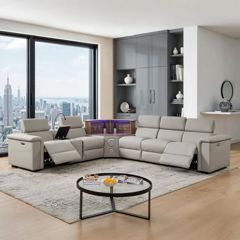 Aurelia Modern 5 Seat Sectional Sofa Powered Recliner Modern living room with a sectional sofa, coffee table, and cityscape view.