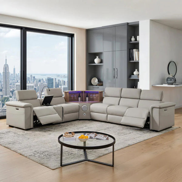 Aurelia Modern 5 Seat Sectional Sofa Powered Recliner Modern living room with a sectional sofa, coffee table, and cityscape view.
