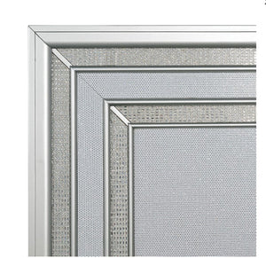 Aurielle Close-up of a graydecorative frame with intricate patterns