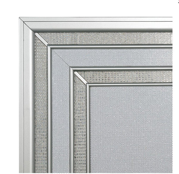 Aurielle Close-up of a graydecorative frame with intricate patterns