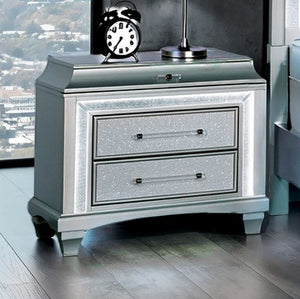 Aurielle gray nightstand with two drawers in a room with large windows.