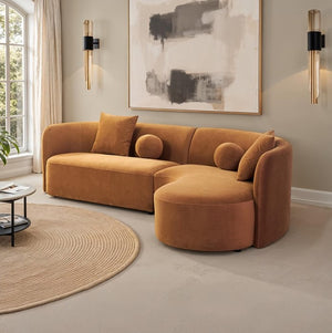 Azalia Modern Caramel Brown Circular Sectional Sofa Brown sectional sofa in a living room with abstract art and round rug.
