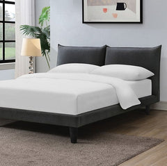 Bassetti Modern Style Shelter Padded Light Gray Bed Bedroom with a bed featuring white bedding and dark upholstered headboard.