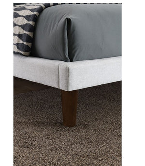 Bassetti Modern Style Shelter Padded White Bed Gray bed with wooden legs on a carpeted floor
