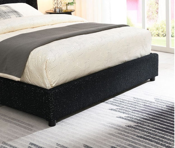 Bassetti Modern Style Shelter Padded Black Bed Style Bed with black frame and white bedding in a bedroom setting