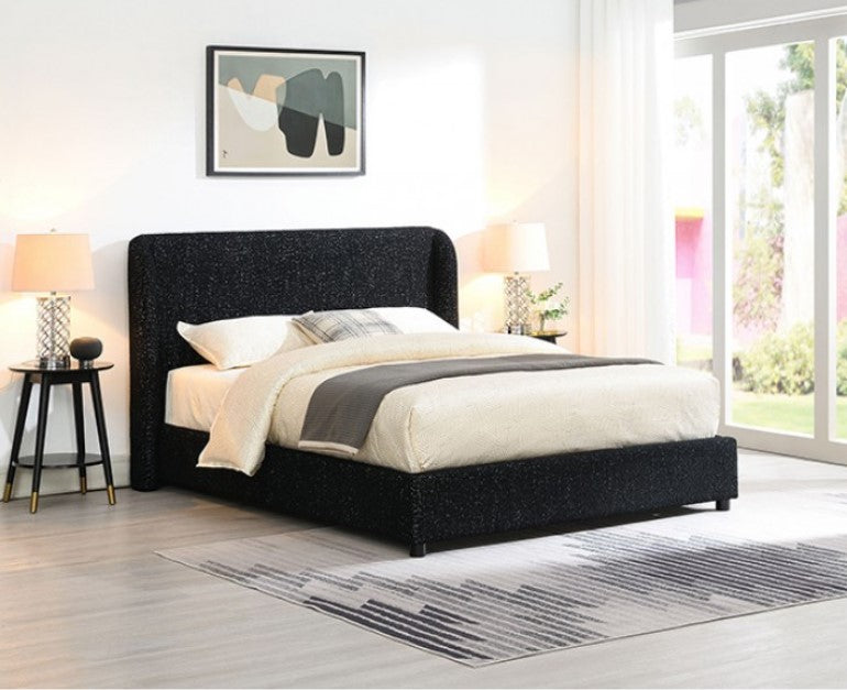 Bassetti Modern Style Shelter Padded Black Bed Style Bedroom with a black upholstered bed, white bedding, and a abstract painting on the wall.