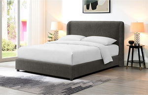 Bassetti Modern Style Shelter Padded Gray Bed Style Gray upholstered bed with white bedding in a room with large windows and lamps.