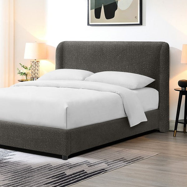 Bassetti Modern Style Shelter Padded Gray Bed Style Gray upholstered bed with white bedding in a bedroom setting.