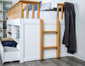 Bawin Open Shelf Bookcase Trundle Youth Bed Wooden bunk bed with white lower bed and ladder against a white wall.