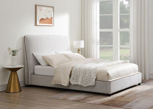 Bella Fully Upholstered Polyester Bed Neatly made bed with white bedding in a bright bedroom