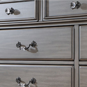 Bella Traditional Gray Dresser Close-up of a silver dresser with decorative handles
