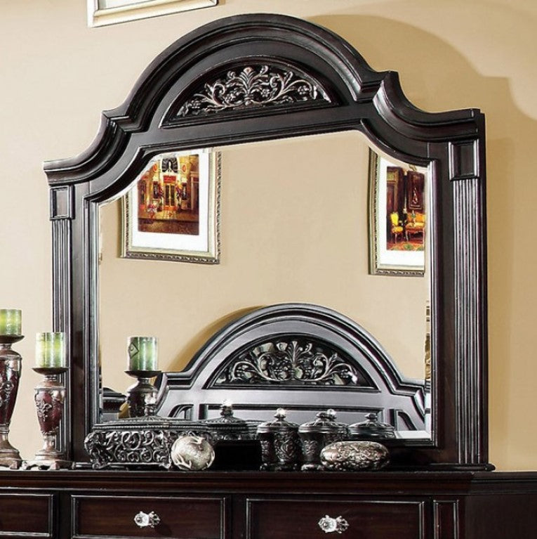 Bella Traditional Dark Walnut Mirror Decorative mirror with intricate black frame on a beige wall