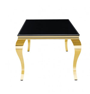 Betsy Black Glass Top Modern Dining Table A modern square side table with a glossy black glass top and a polished gold metal frame with curved cabriole-style legs, shown against a plain white background.