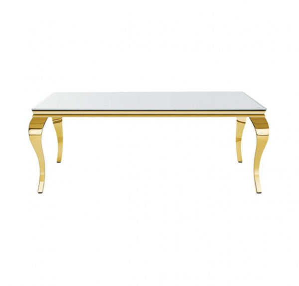 A rectangular table with a glossy white top and polished gold curved legs, shown against a plain white background.