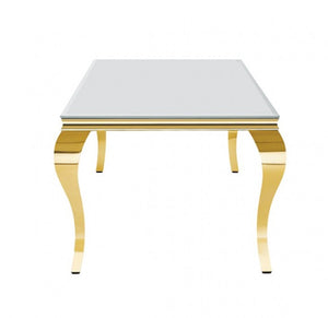 Betsy White Glass Top Modern Dining Table A modern square table with a reflective silver mirror glass top and highly polished gold-tone metal cabriole-style legs, shown against a plain white background.