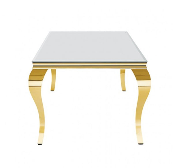 Betsy White Glass Top Modern Dining Table A modern square table with a reflective silver mirror glass top and highly polished gold-tone metal cabriole-style legs, shown against a plain white background.