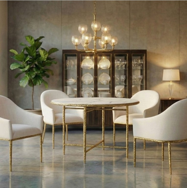 Bojani White Matte Gold Upholstered Arm Chair White upholstered chair with gold metal legs on a white background