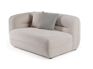 Boniser Modern Curved Off White Sectional Sofa A modern curved two-seater sofa in a light beige fabric, featuring a textured light gray throw pillow, set against a plain white background.