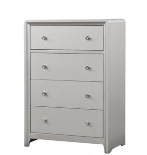 Borch Contemporary Champagne Finish Chest A five-drawer chest of drawers in a light gray finish, featuring small round silver knobs and a slightly tapered, modern silhouette, shown on a plain white background.
